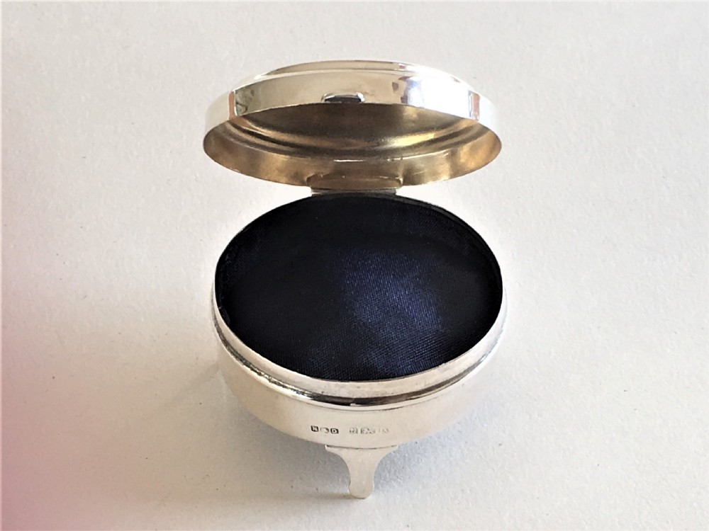 A diminutive silver trinket/ring box  View V