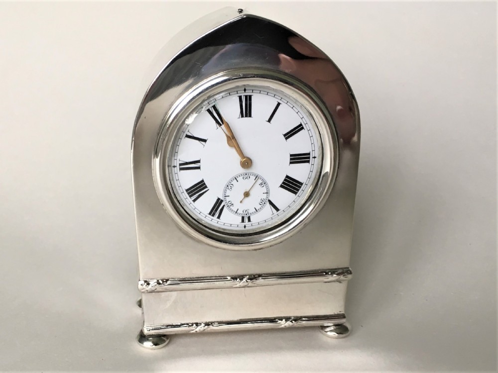 A superb Edwardian small silver clock View V