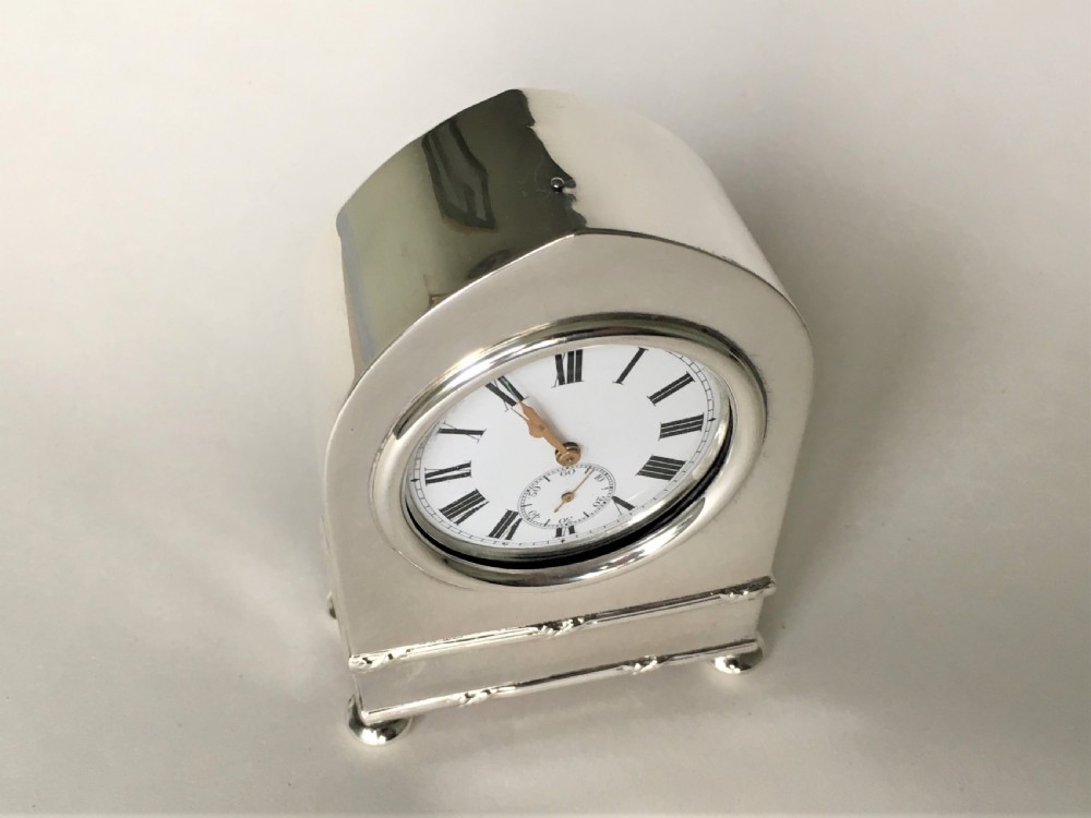 A superb Edwardian small silver clock View VI