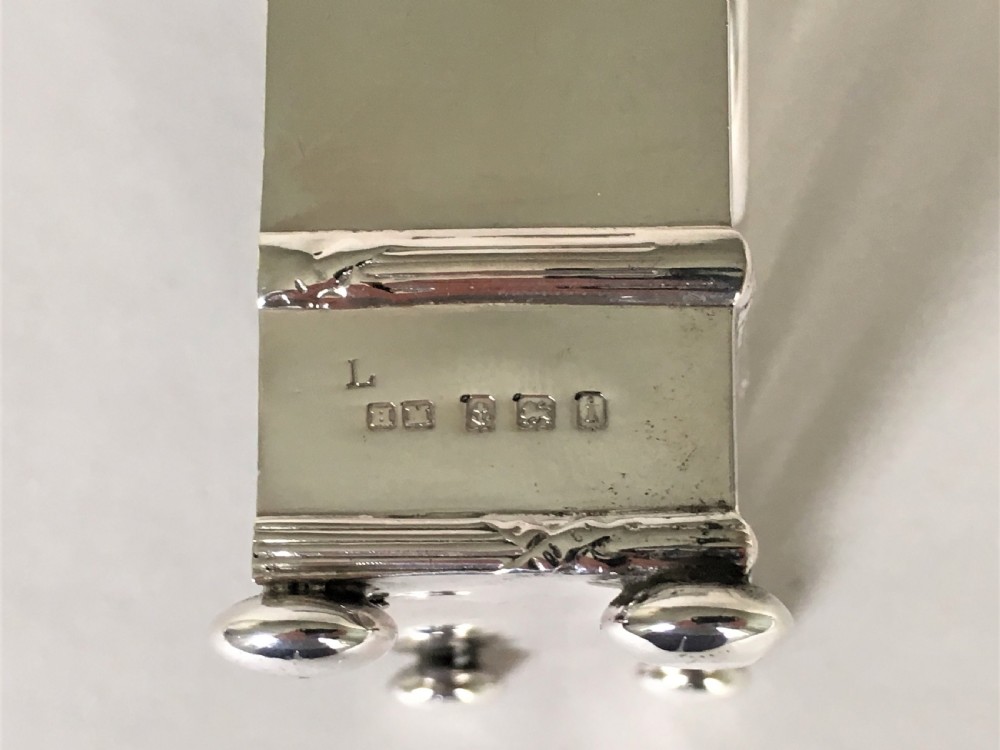 A superb Edwardian small silver clock View IX