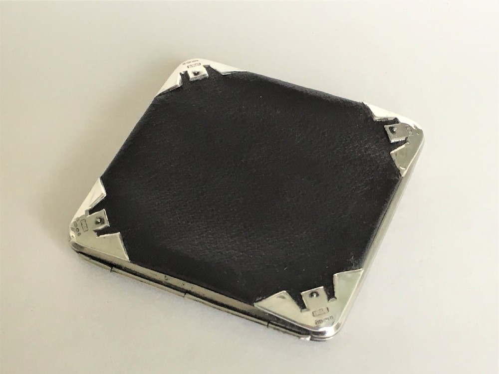 An Edwardian silver mounted leather wallet View II