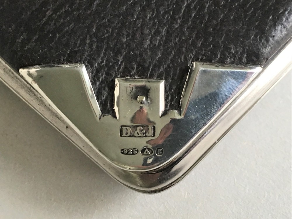 An Edwardian silver mounted leather wallet View VI