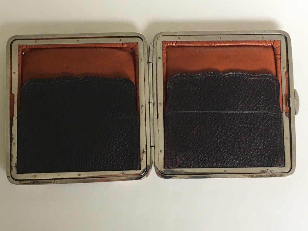 An Edwardian silver mounted leather wallet View VII