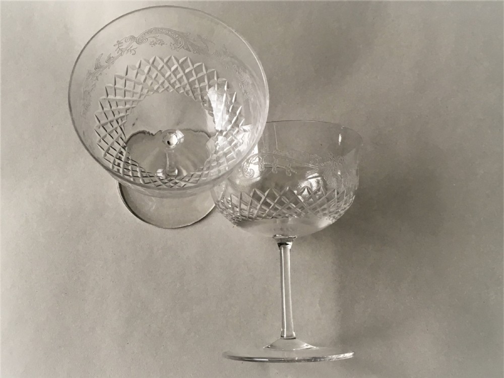 A charming pair of etched Edwardian champagne glasses View V