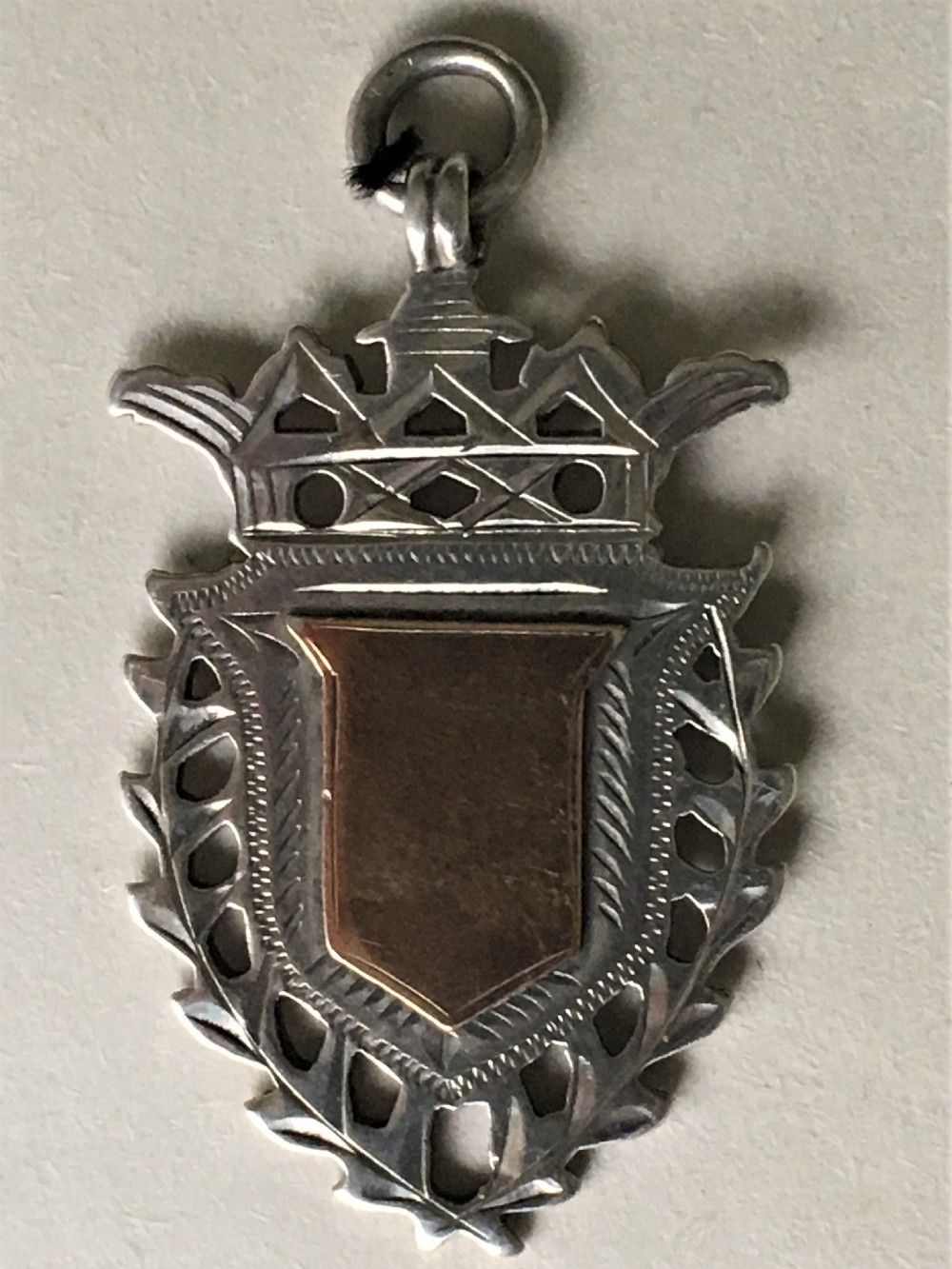 A superb Edwardian silver & gold watch fob