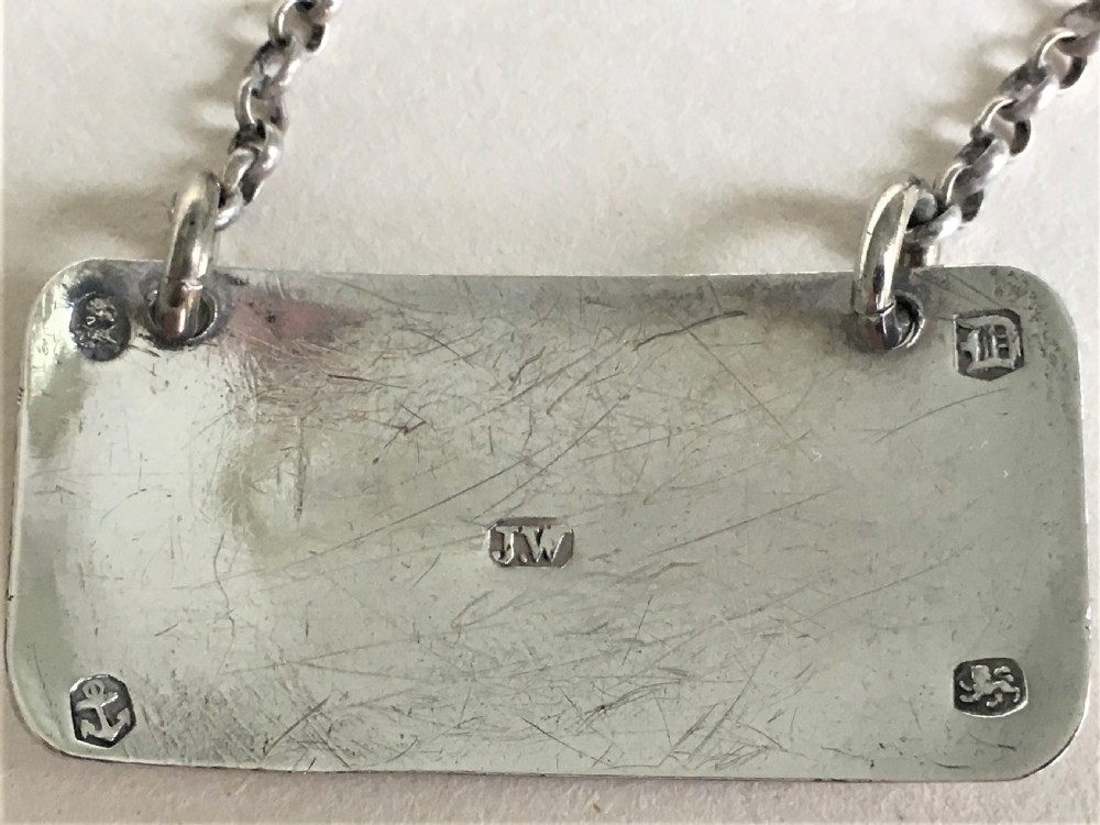 A fine Georgian silver Brandy decanter label View V