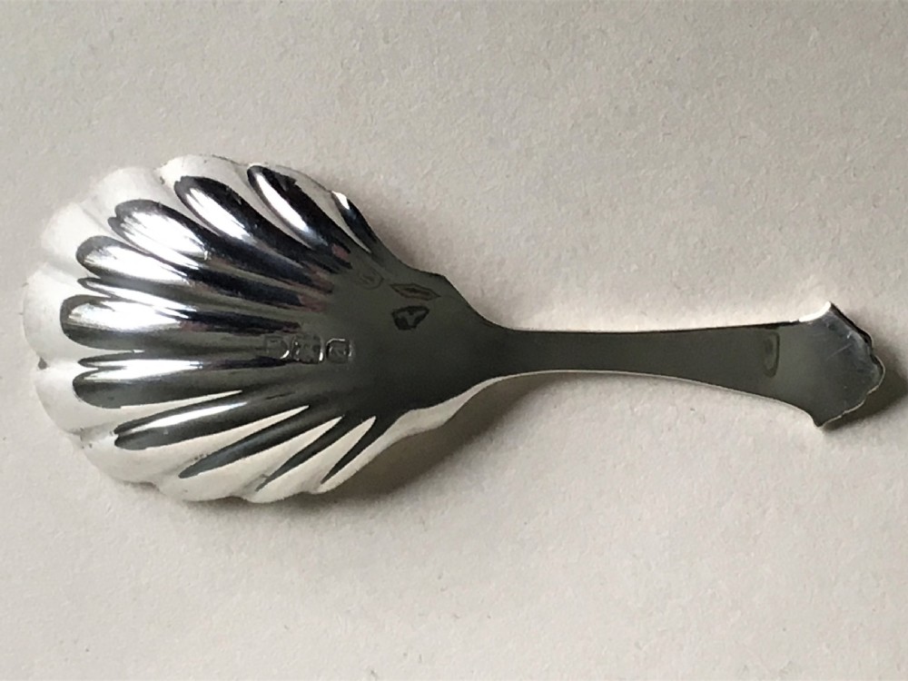 A handsome Onslow pattern silver caddy spoon View II