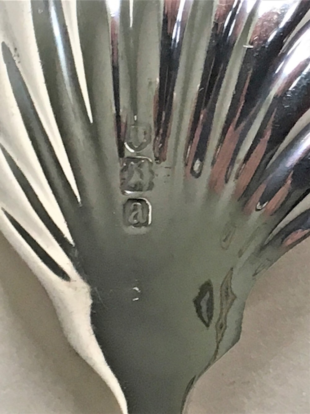 A handsome Onslow pattern silver caddy spoon View III