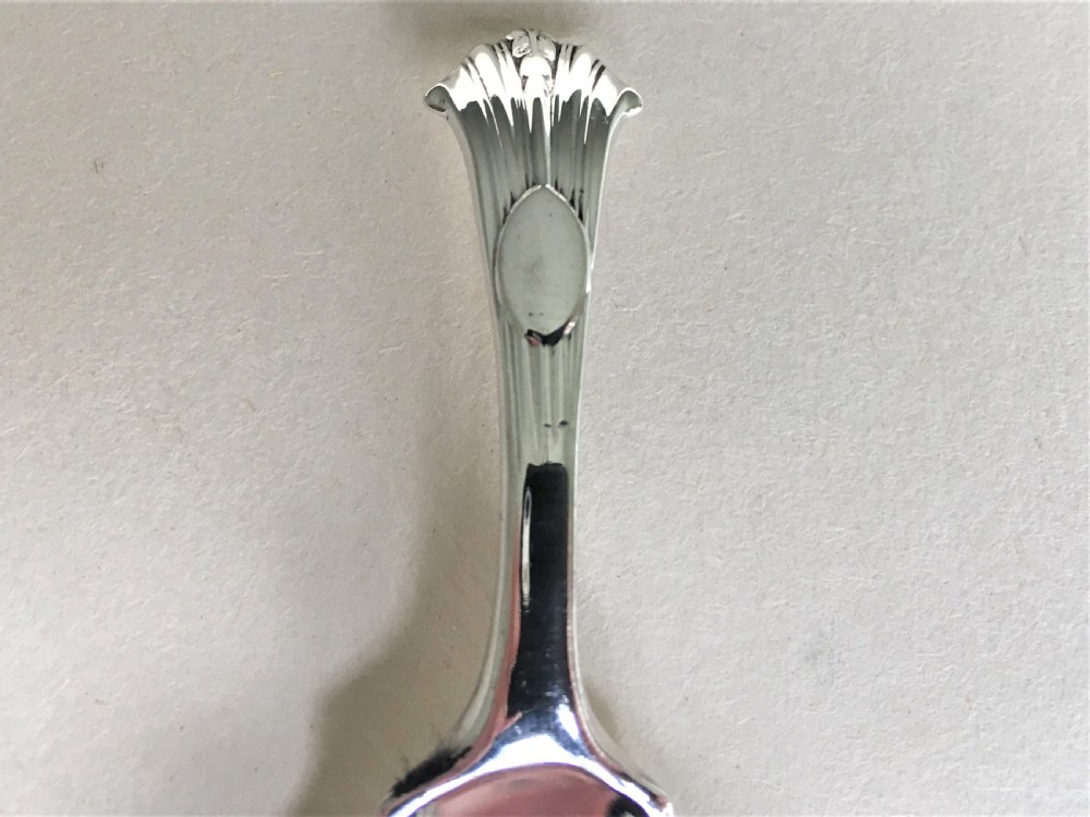A handsome Onslow pattern silver caddy spoon View IV