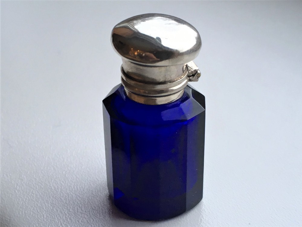 A Victorian silver mounted Bristol blue scent bottle