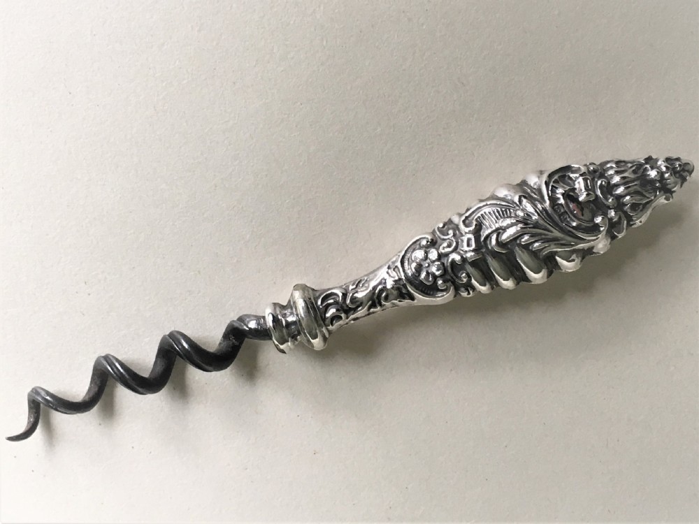 An unusual Edwardian silver handled corkscrew