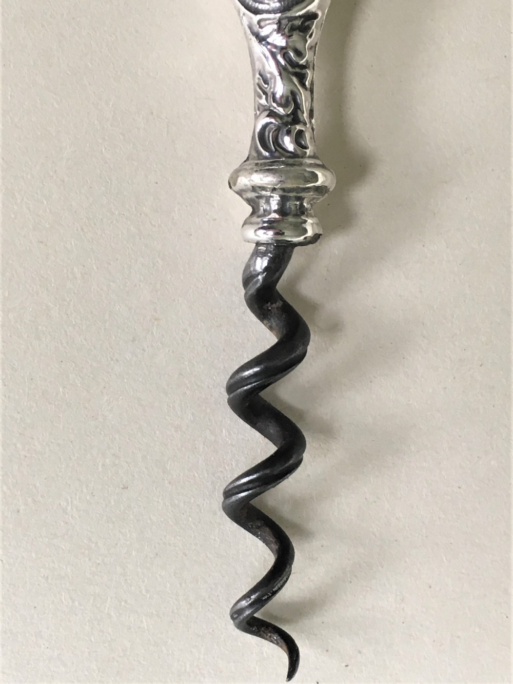 An unusual Edwardian silver handled corkscrew View II