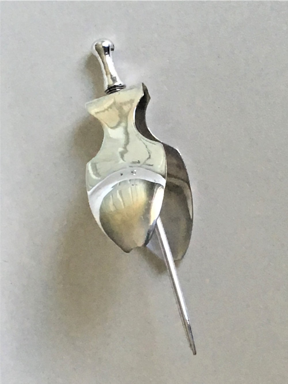 An extremely rare silver lemon squeezer