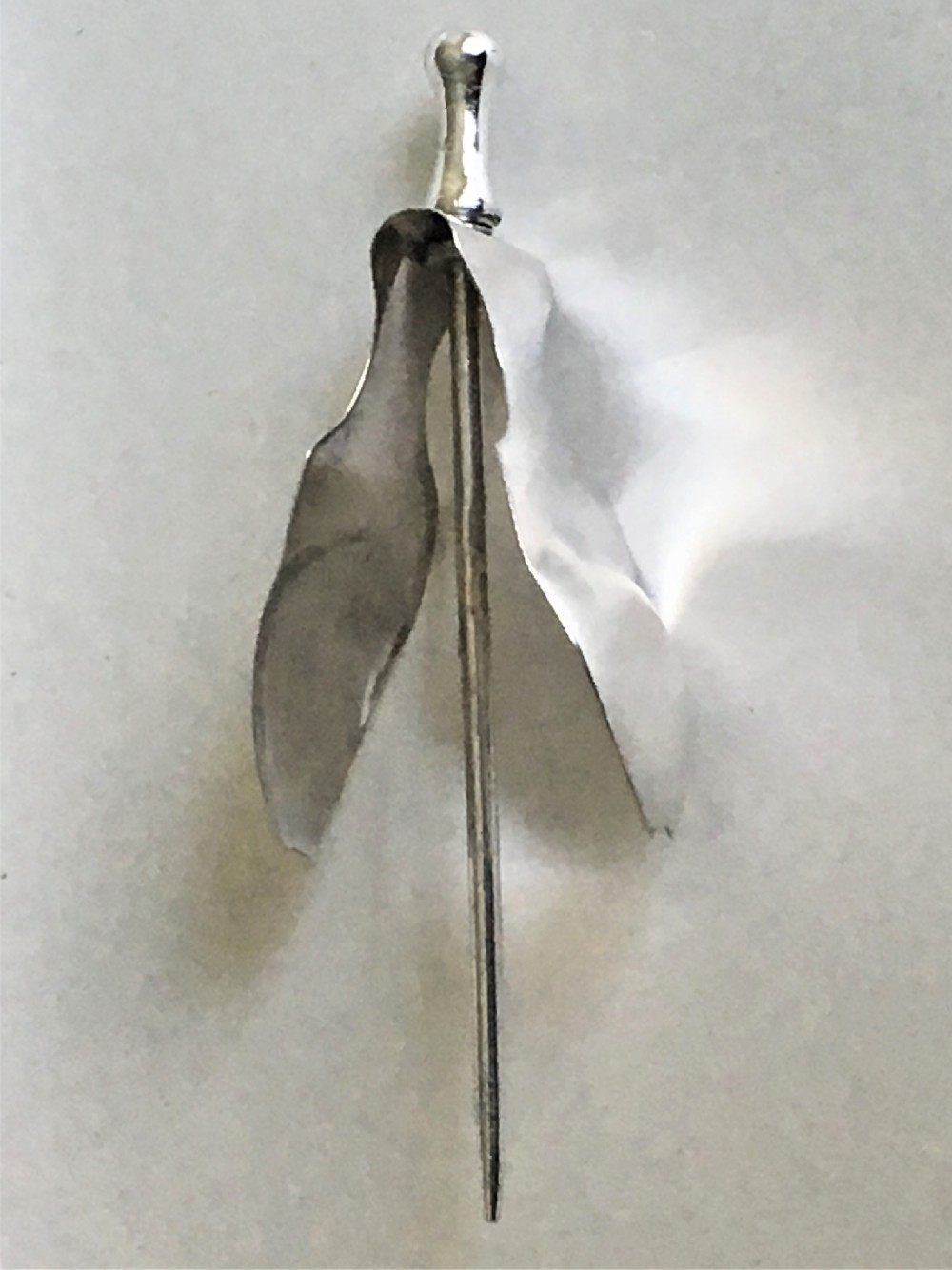An extremely rare silver lemon squeezer View II