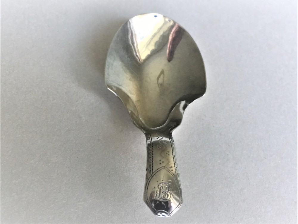 A gorgeous 18th Century silver caddy spoon View II