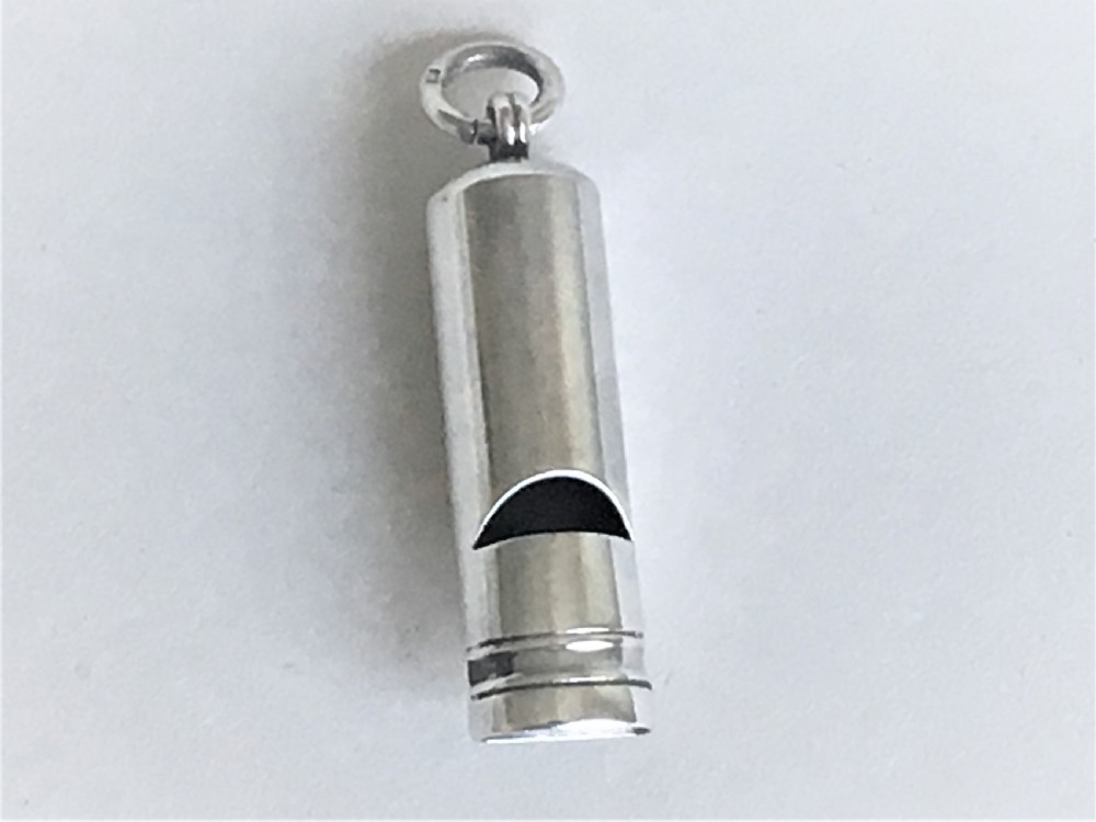 A large Edwardian silver dog whistle