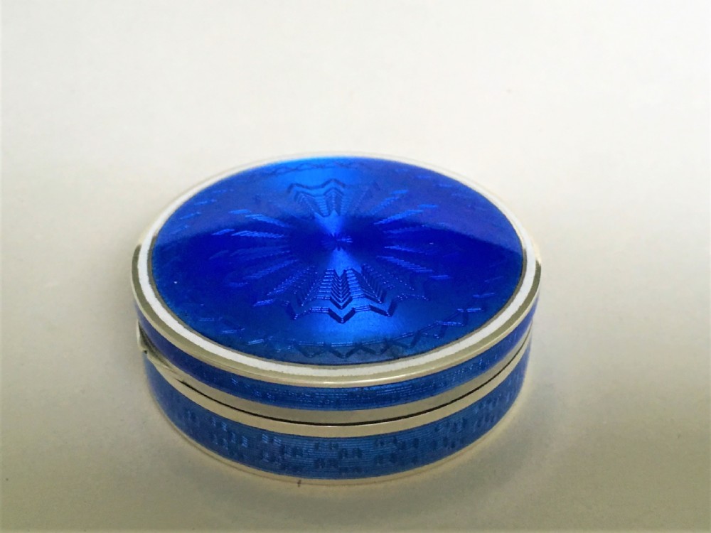 A fabulous silver & enamel dressing table box