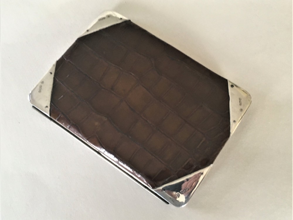 A superb Edwardian silver & crocodile wallet