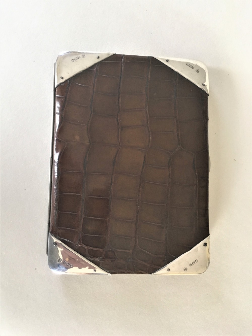 A superb Edwardian silver & crocodile wallet View II