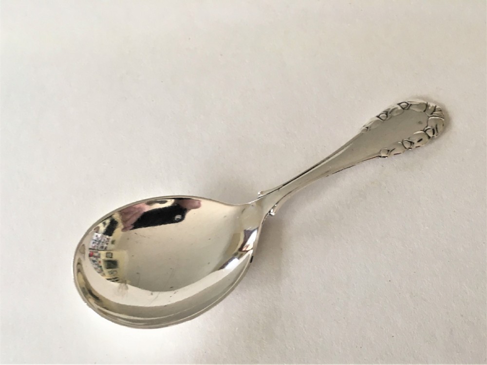 A superb Georg Jensen silver caddy spoon