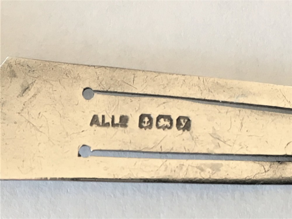 A rare silver Mr. Punch bookmark View IV