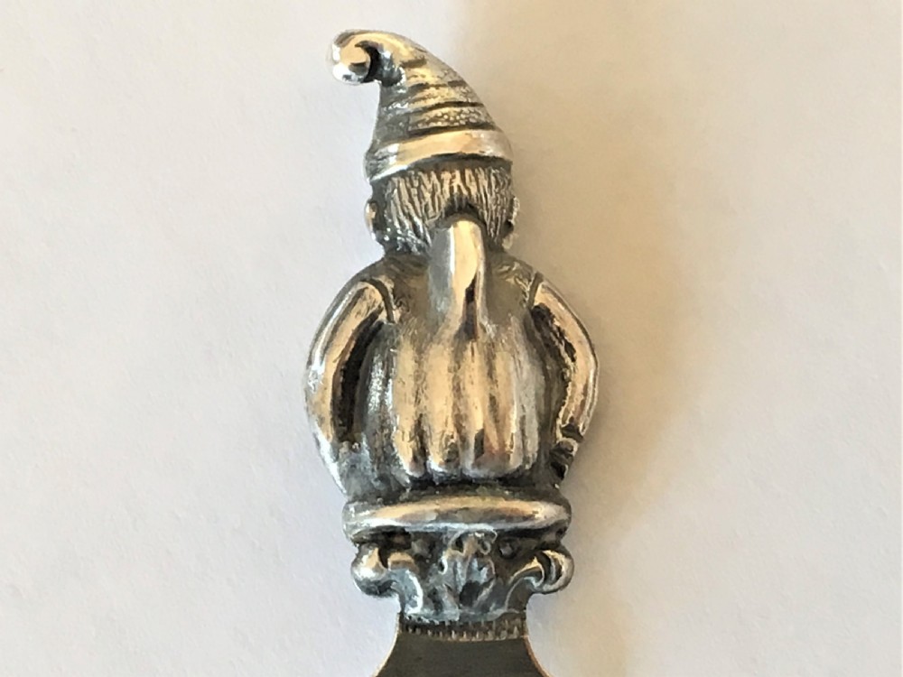 A rare silver Mr. Punch bookmark View VI