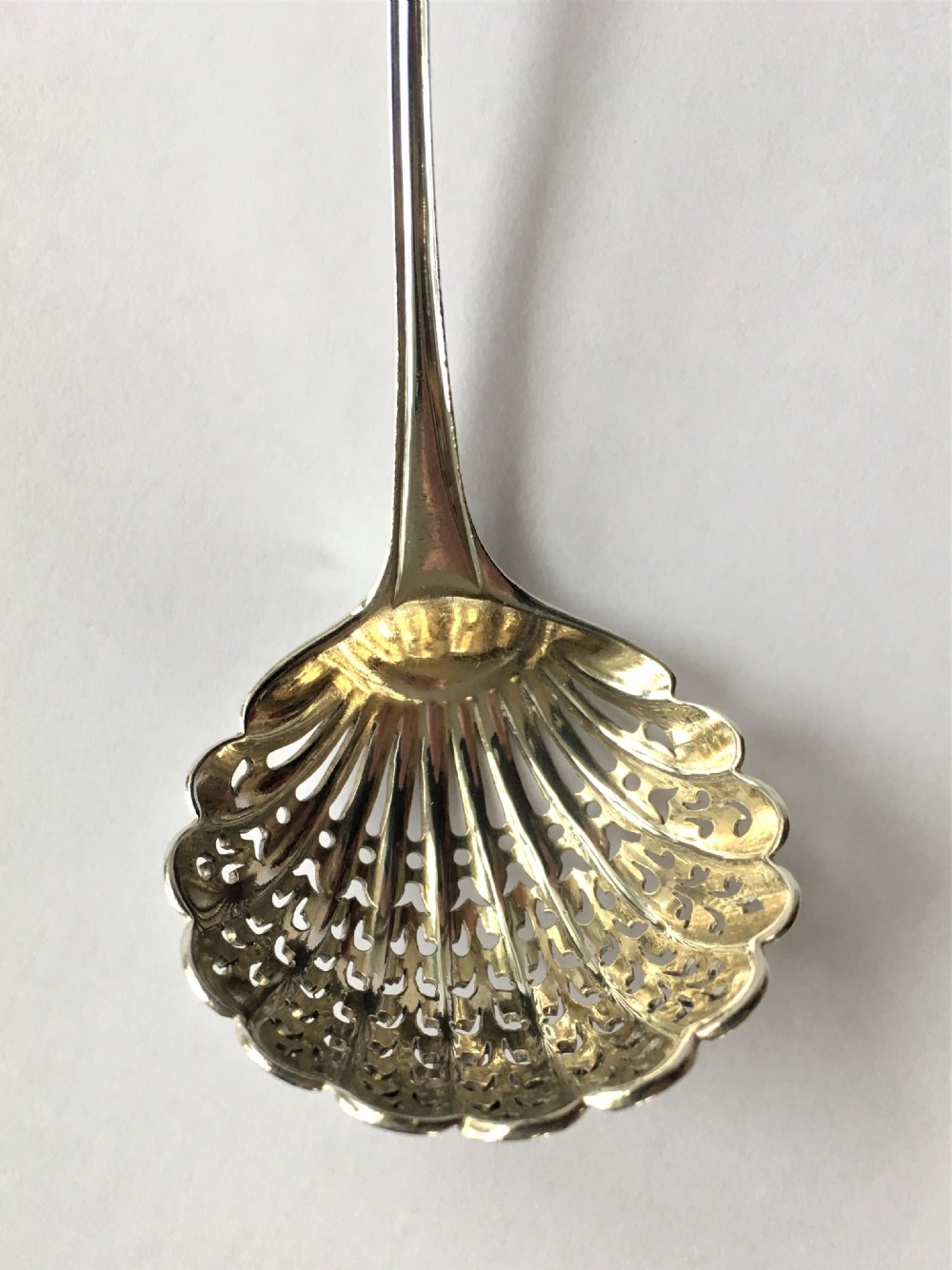  An attractive Onslow pattern Victorian silver sifter spoon View II