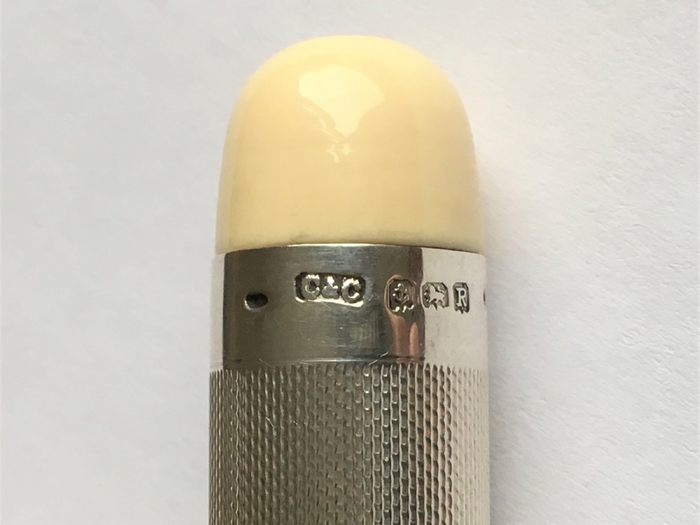 A stylish Art Deco silver theatre programme torch View III