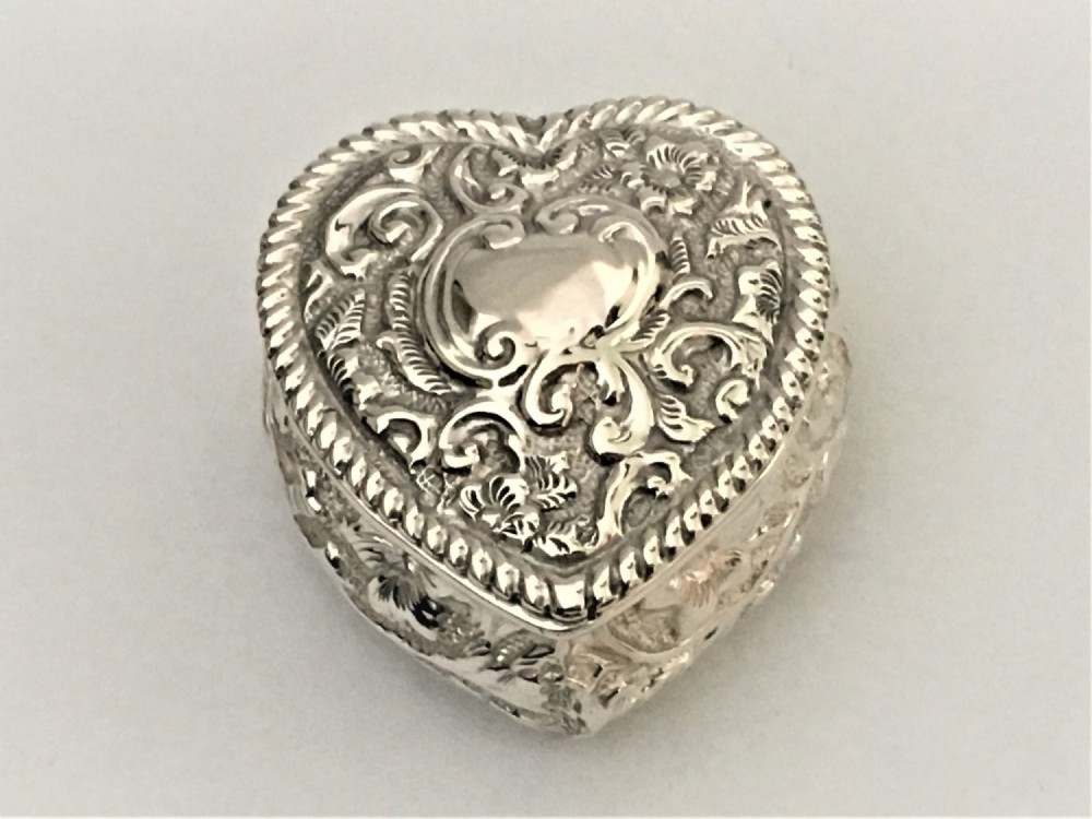 A charming Victorian silver heart pill box