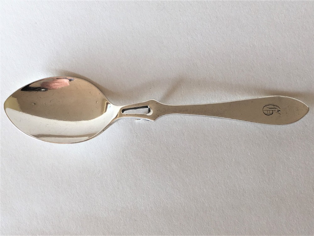 An Edwardian silver honey spoon of patented design View III