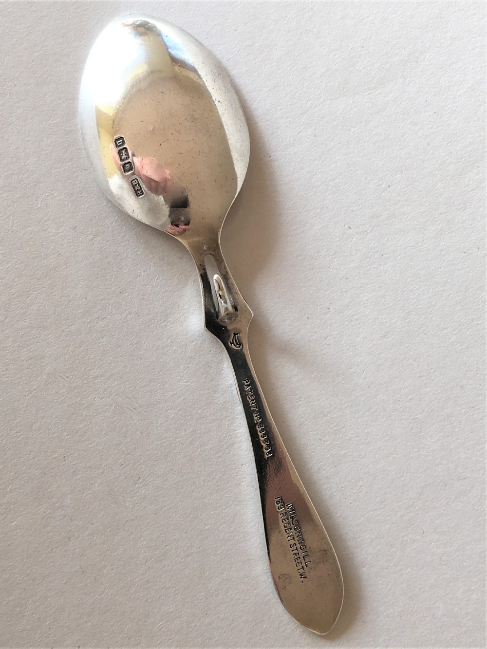 An Edwardian silver honey spoon of patented design View V