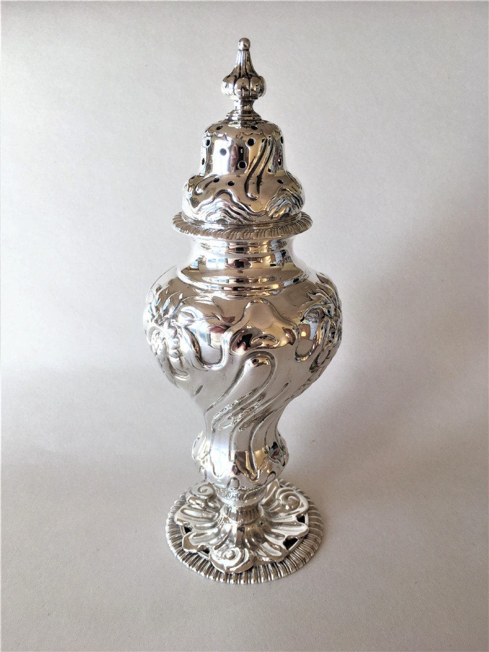 A fabulous Victorian silver sugar caster