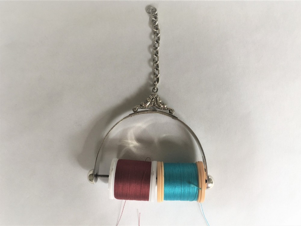 A Victorian novelty stirrup silver cotton holder