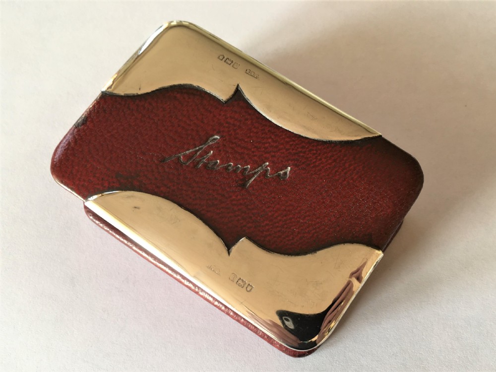 An Edwardian silver mounted triple stamp box View IX