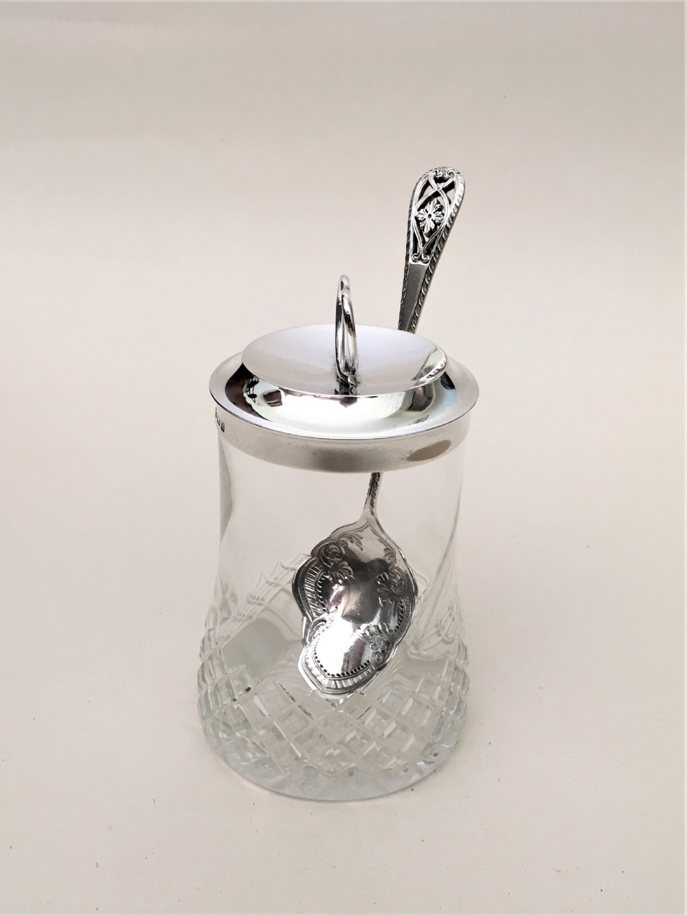 An Edwardian silver mounted 'heart' finial preserve jar & spoon View II