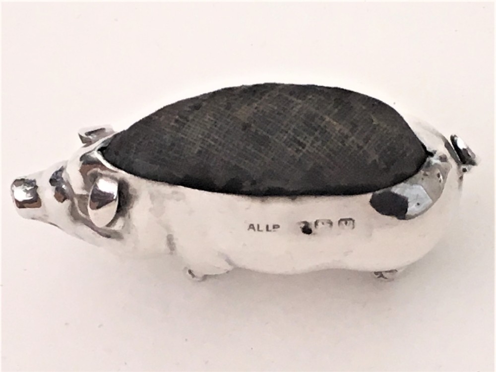 A sought after silver pig pin cushion View VII