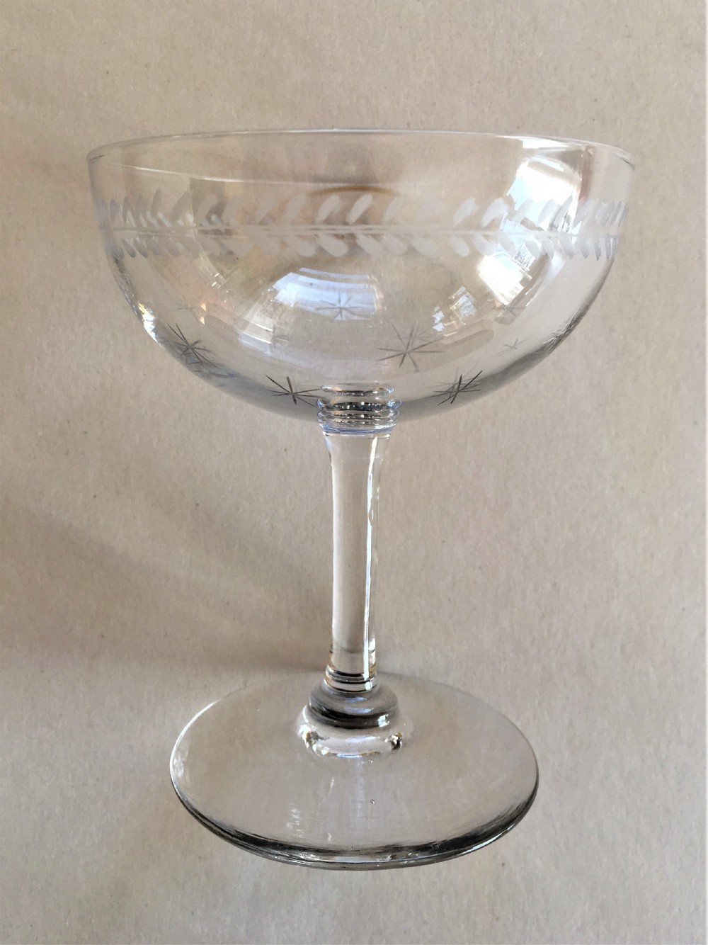 A harlequin set of 6 etched champagne bowls View V