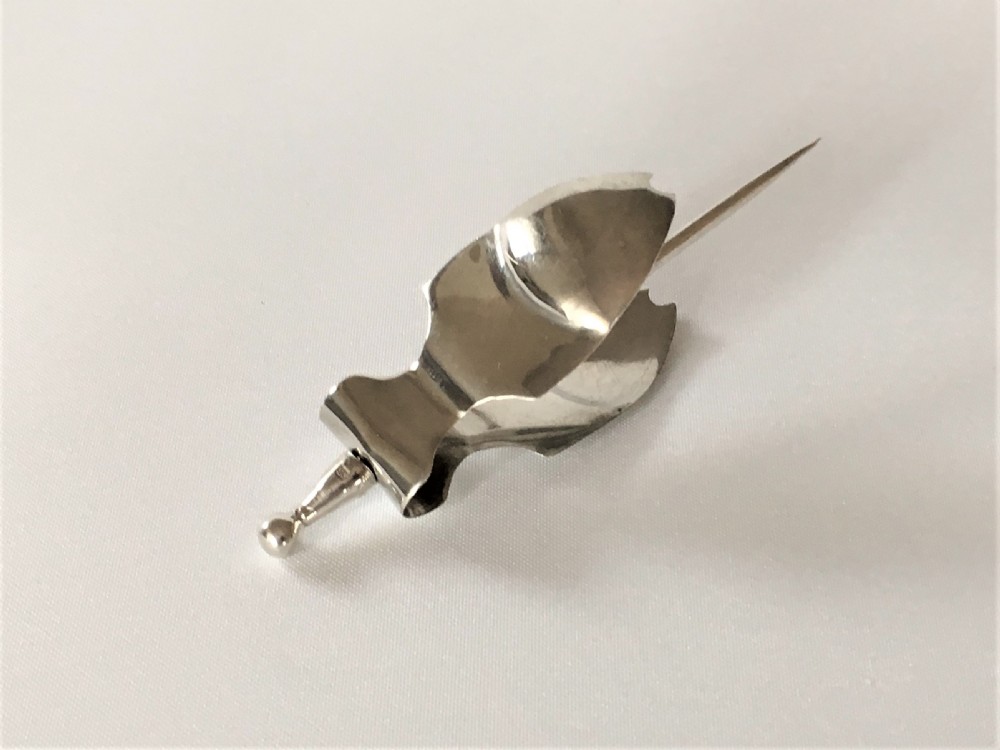 A rare George V silver lemon squeezer