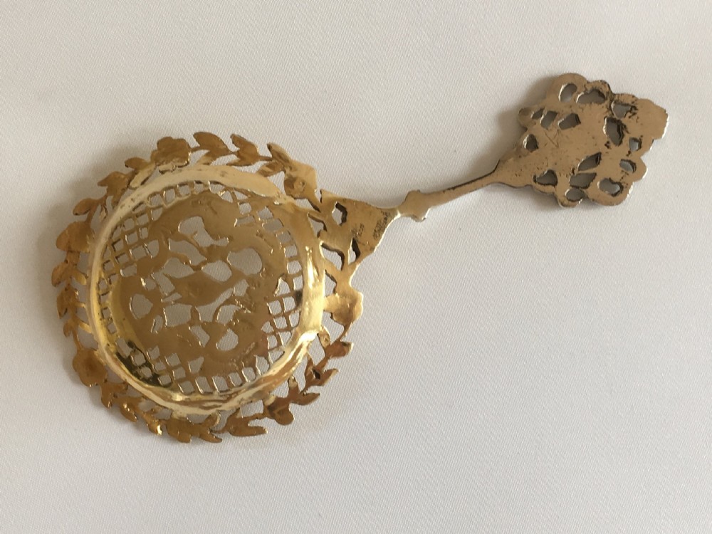 A fabulous William Comyns pierced silver gilt bonbon spoon View III