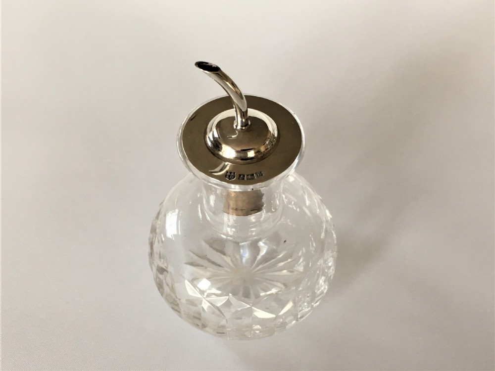 A silver mounted Angostura Bitters jigger View II