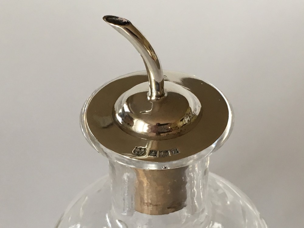A silver mounted Angostura Bitters jigger View IV