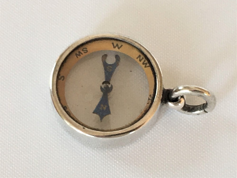 A rare silver George V compass