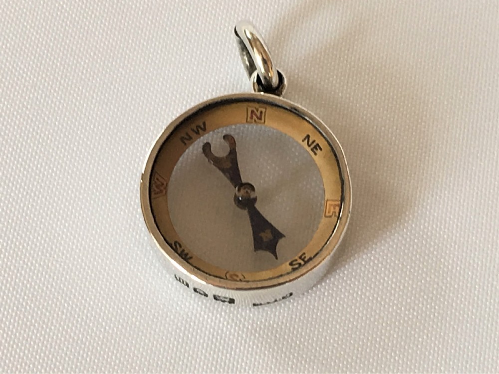 A rare silver George V compass View II