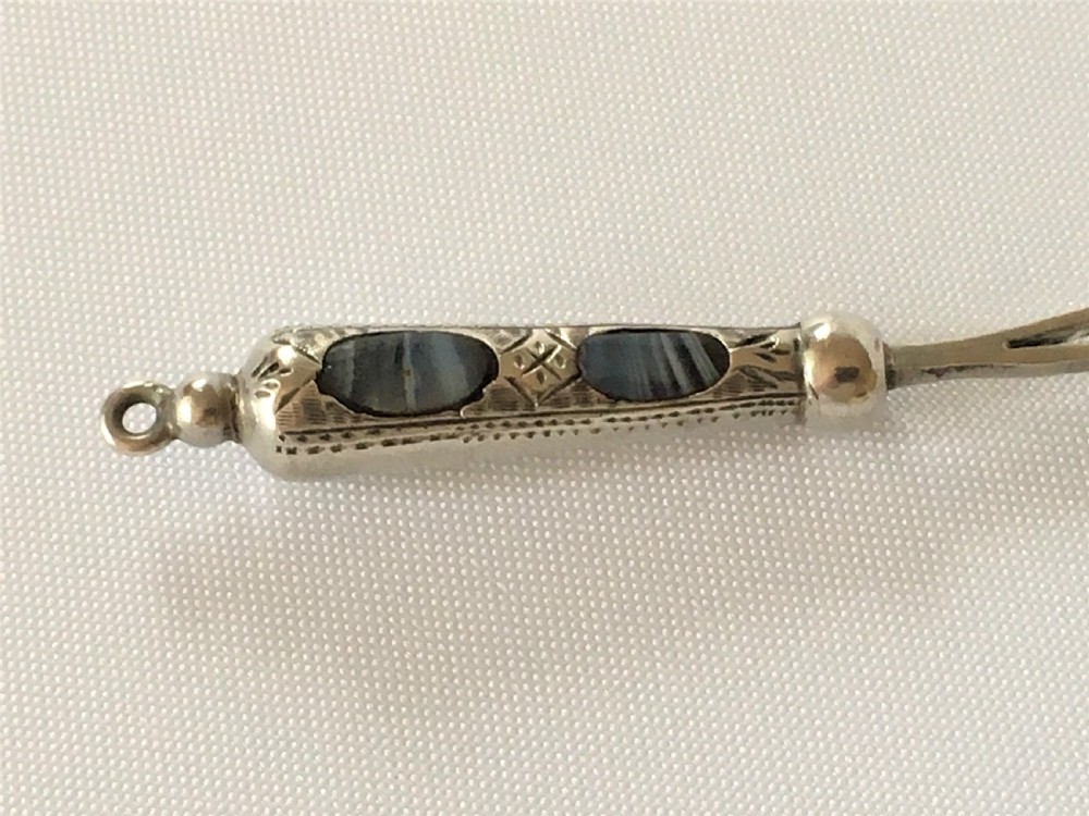 A gorgeous Victorian silver & agate ribbon threader View II