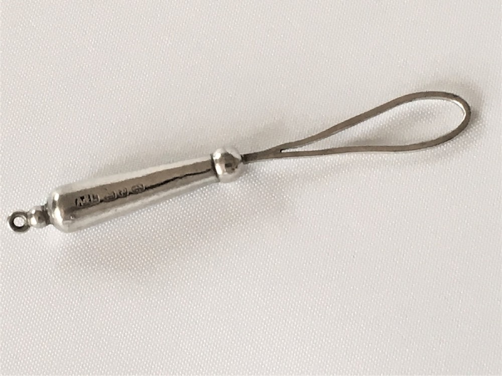 A gorgeous Victorian silver & agate ribbon threader View III