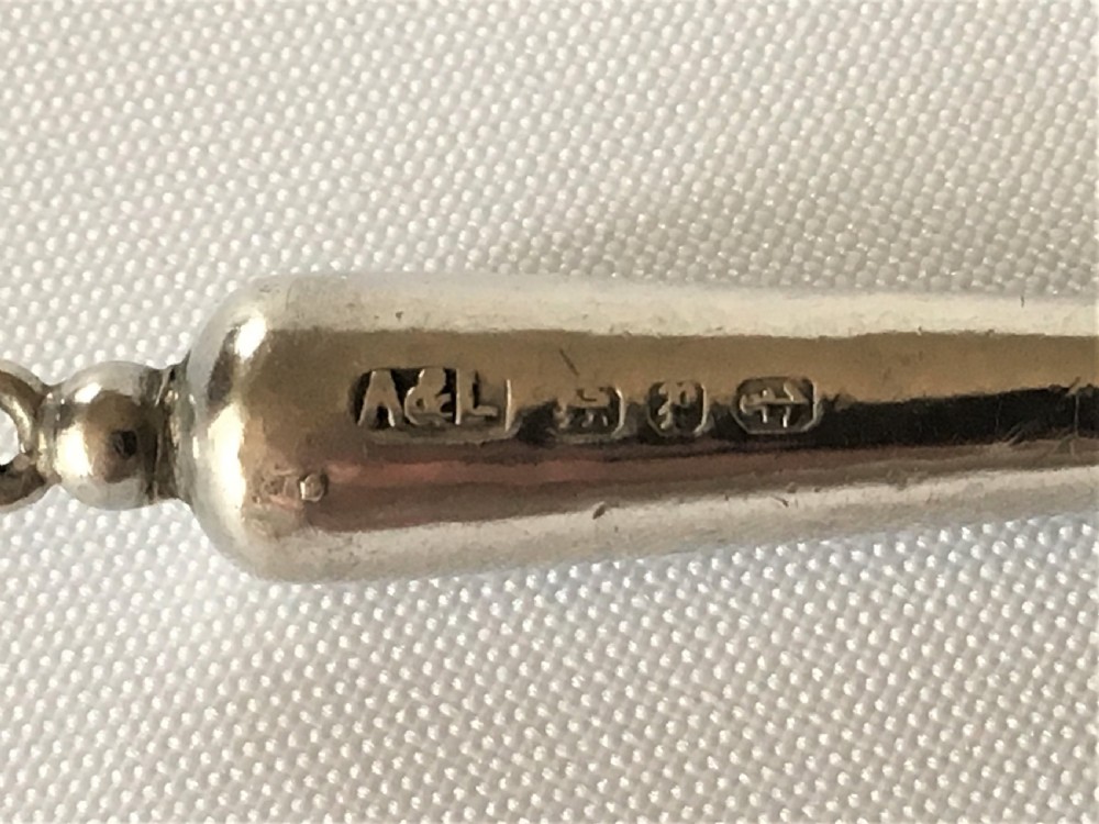 A gorgeous Victorian silver & agate ribbon threader View IV