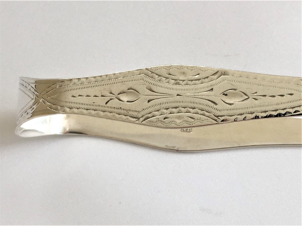 A gorgeous pair of 18th Century silver tongs View III