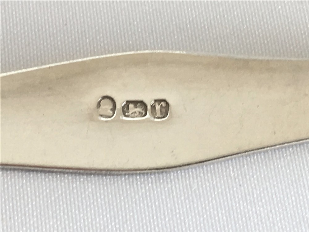 A gorgeous pair of 18th Century silver tongs View V