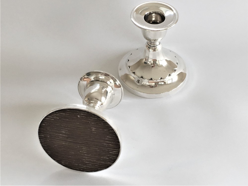 A good pair of third height silver candlesticks View IV