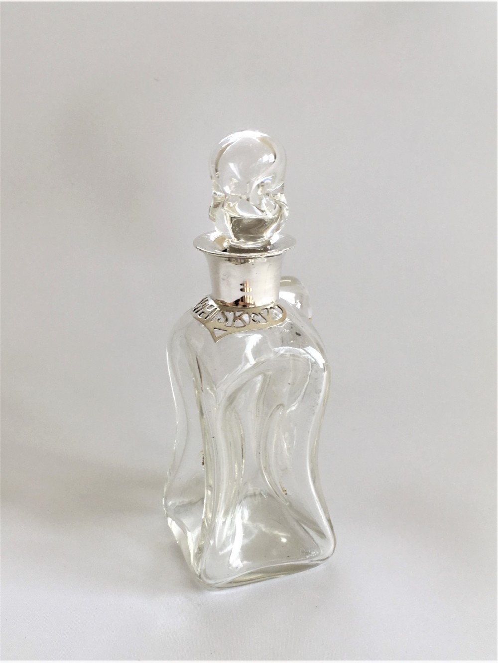 An unusual Edwardian silver mounted Whiskey noggin
